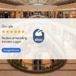 A digital rendering of a Google Review Card Free overlaying an empty, brightly lit shopping mall interior.