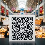 QR code linking to a Google Reviews page for a business in a mall or market setting.